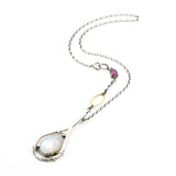 Moonstone teardrop cabochon pendant necklace in silver bezel and prongs setting with silver vine design and pink sapphire gemstone secondary