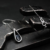 Silver teardrop pendant with blue sapphire gemstone set with sterling silver chain necklace