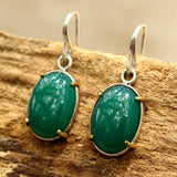 Green onyx cabochon earrings in silver bezel setting with polished brass accent prongs - Metal Studio Jewelry