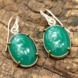 Green onyx cabochon earrings in silver bezel setting with polished brass accent prongs - Metal Studio Jewelry