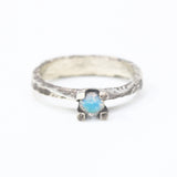 Tiny round faceted moonstone ring in silver prongs setting with sterling silver hard texture oxidized band - Metal Studio Jewelry