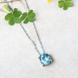 Oval Blue topaz pendant necklace in silver bezel and prongs setting with aquamarine beads secondary on oxidized sterling silver chain - Metal Studio Jewelry