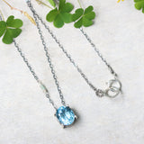 Oval Blue topaz pendant necklace in silver bezel and prongs setting with aquamarine beads secondary on oxidized sterling silver chain - Metal Studio Jewelry