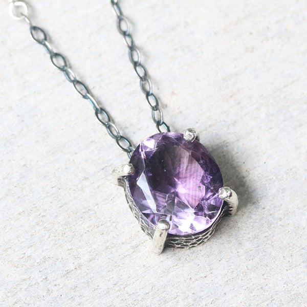 Oval Amethyst pendant necklace in silver bezel and prongs setting with amethyst beads secondary on oxidized sterling silver chain - Metal Studio Jewelry