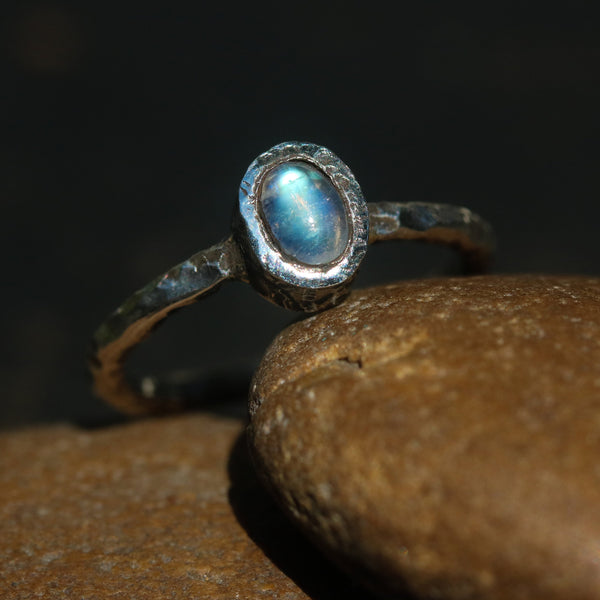 Dainty oval moonstone ring in silver bezel setting with oxidized texture sterling silver band - Metal Studio Jewelry