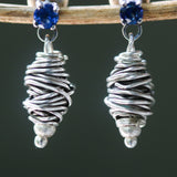 Sterling silver stud earrings with faceted blue sapphire in prongs setting with silver bird's nest - Metal Studio Jewelry