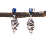 Sterling silver stud earrings with faceted blue sapphire in prongs setting with silver bird's nest - Metal Studio Jewelry