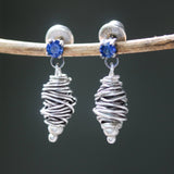 Sterling silver stud earrings with faceted blue sapphire in prongs setting with silver bird's nest - Metal Studio Jewelry