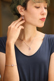 Oval cabochon Rose quartz earrings in silver bezel setting with polished brass accent prongs - Metal Studio Jewelry