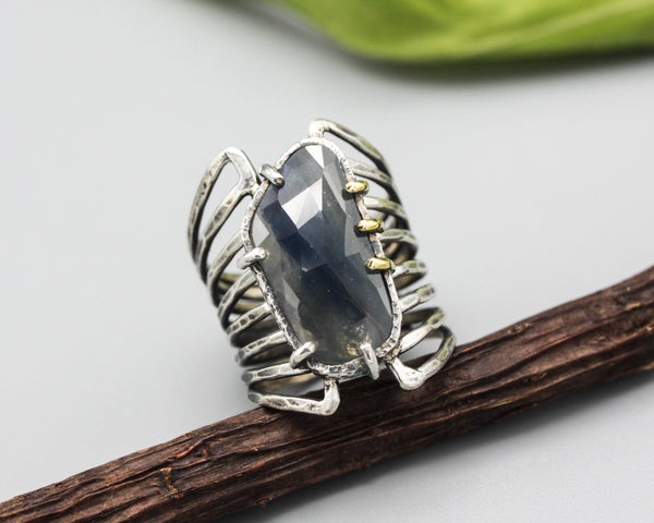 Blue sapphire ring in silver bezel setting and sterling silver skeleton multi wrap with hammer textured band - Metal Studio Jewelry