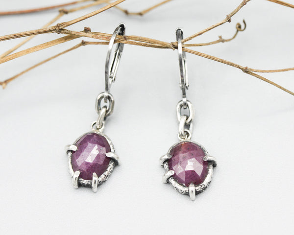 Pink sapphire oval faceted earrings in bezel and prongs setting with silver chain on oxidized sterling silver hooks