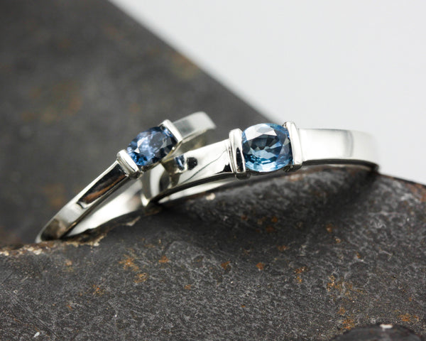 Wedding band set his and hers with blue sapphire gemstones