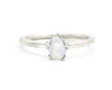 Teardrop faceted Moonstone ring in prongs setting with sterling silver oxidized texture band