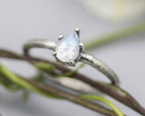Teardrop faceted Moonstone ring in prongs setting with sterling silver oxidized texture band