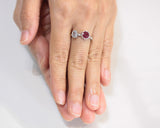 Round red ruby ring in silver bezel setting with blue topaz  sterling silver oxidized twist design band
