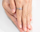 Round cabochon moonstone ring in bezel setting with sterling silver band