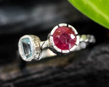 Round red ruby ring in silver bezel setting with blue topaz  sterling silver oxidized twist design band