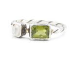 Peridot ring and moonstone with sterling silver oxidized twist band