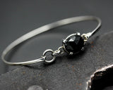 Black onyx bangle bracelet in silver bezel setting with sterling silver high polish finished band