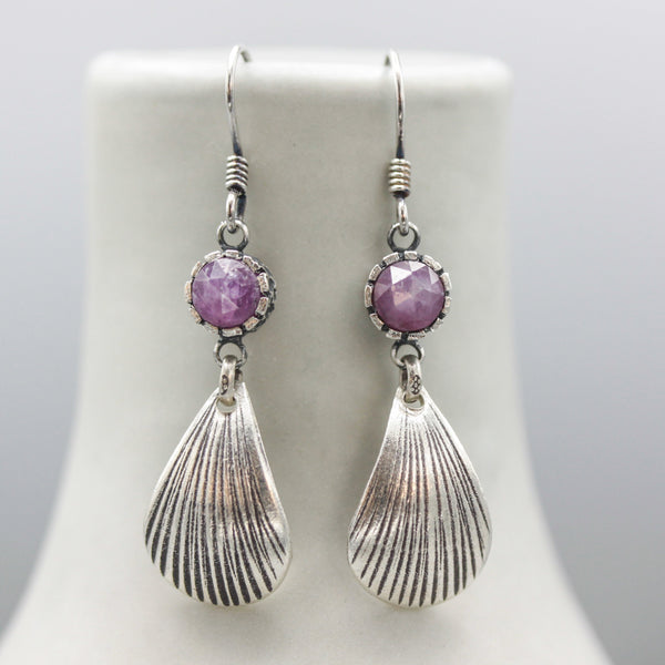 Pink sapphire earrings in silver bezel setting with sterling silver shell shape on silver hooks style