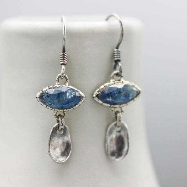 Marquise blue kyanite earrings in silver bezel setting with silver leaf on sterling silver hooks style