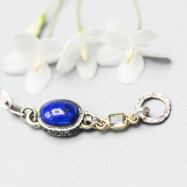 Lapis lazuli pendant bracelet with green tourmaline gemstone on sterling silver chain