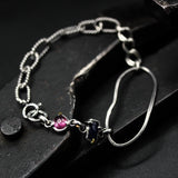 Handcrafted bracelet blue sapphire with delicate pink sapphire accents on a sterling silver chain