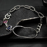 Handcrafted bracelet blue sapphire with delicate pink sapphire accents on a sterling silver chain