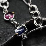 Handcrafted bracelet blue sapphire with delicate pink sapphire accents on a sterling silver chain