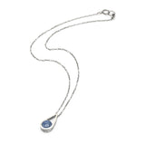Silver teardrop pendant necklace with round cabochon blue kyanite gemstone on oxidized sterling silver chain