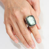 Rectagle cabochon Labradorite cocktail ring in silver bezel and prongs setting with sterling silver band