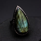 Teardrop Olive green Labradorite cocktail ring in silver bezel setting with sterling silver band