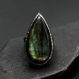 Teardrop Olive green Labradorite cocktail ring in silver bezel setting with sterling silver band