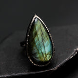 Teardrop Olive green Labradorite cocktail ring in silver bezel setting with sterling silver band