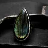 Teardrop Olive green Labradorite cocktail ring in silver bezel setting with sterling silver band