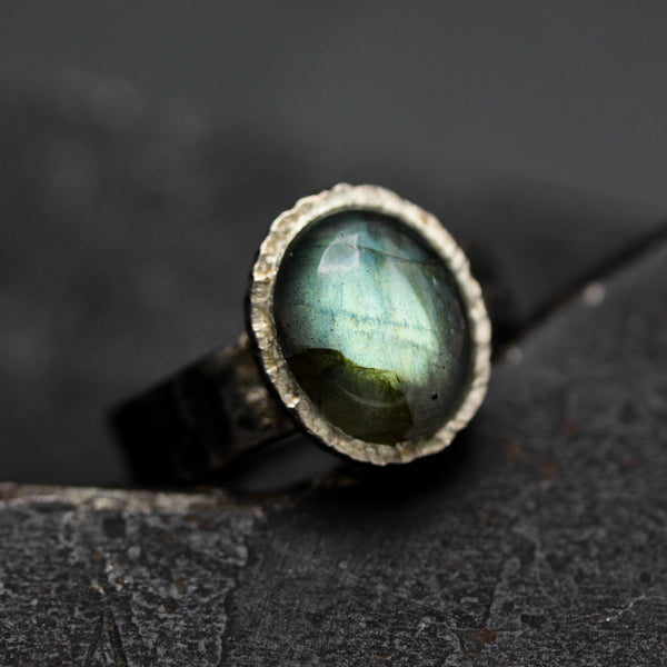 Oval cabochon Labradorite ring in bezel setting with silver texture oxidized thick band