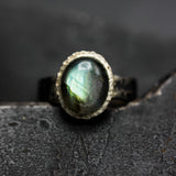 Oval cabochon Labradorite ring in bezel setting with silver texture oxidized thick band