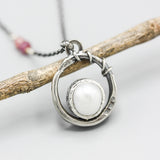 Freshwater pearls pendant necklace in sterling silver bezel setting with silver vine design on sterling silver chain