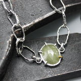 Bracelet oval faceted gray sapphire and Ruby decoration with hoop hard texture oxidized sterling silver chain