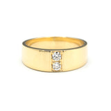 Men's ring in 18k gold featuring a high-polished band with 2 round faceted diamonds.