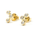 18k gold stud earrings featuring three round diamonds in a bezel setting