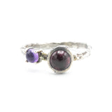 Round Garnet ring and Amethyst with oxidized sterling silver hard texture band