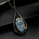 Oval cabochon moonstone pendant necklace with oxidized sterling silver chain