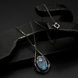 Oval cabochon moonstone pendant necklace with oxidized sterling silver chain
