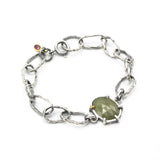 Bracelet oval faceted gray sapphire and Ruby decoration with hoop hard texture oxidized sterling silver chain