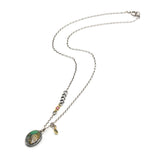 Oval turquoise pendant necklace in silver bezel setting with green multi-sapphire gemstone