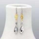 Yellow sapphire earrings in bezel setting with silver leaf on sterling silver hooks style