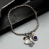 Sterling silver bracelet with Emerald in silver hand shape with Lapis lazuli, Moonstone and red sapphire gemstone