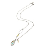 Oval Turquoise pendant necklace in silver bezel setting with sterling silver chain