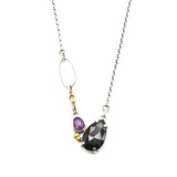 Teardrop black onyx necklace with pink sapphire in silver bezel and prongs setting